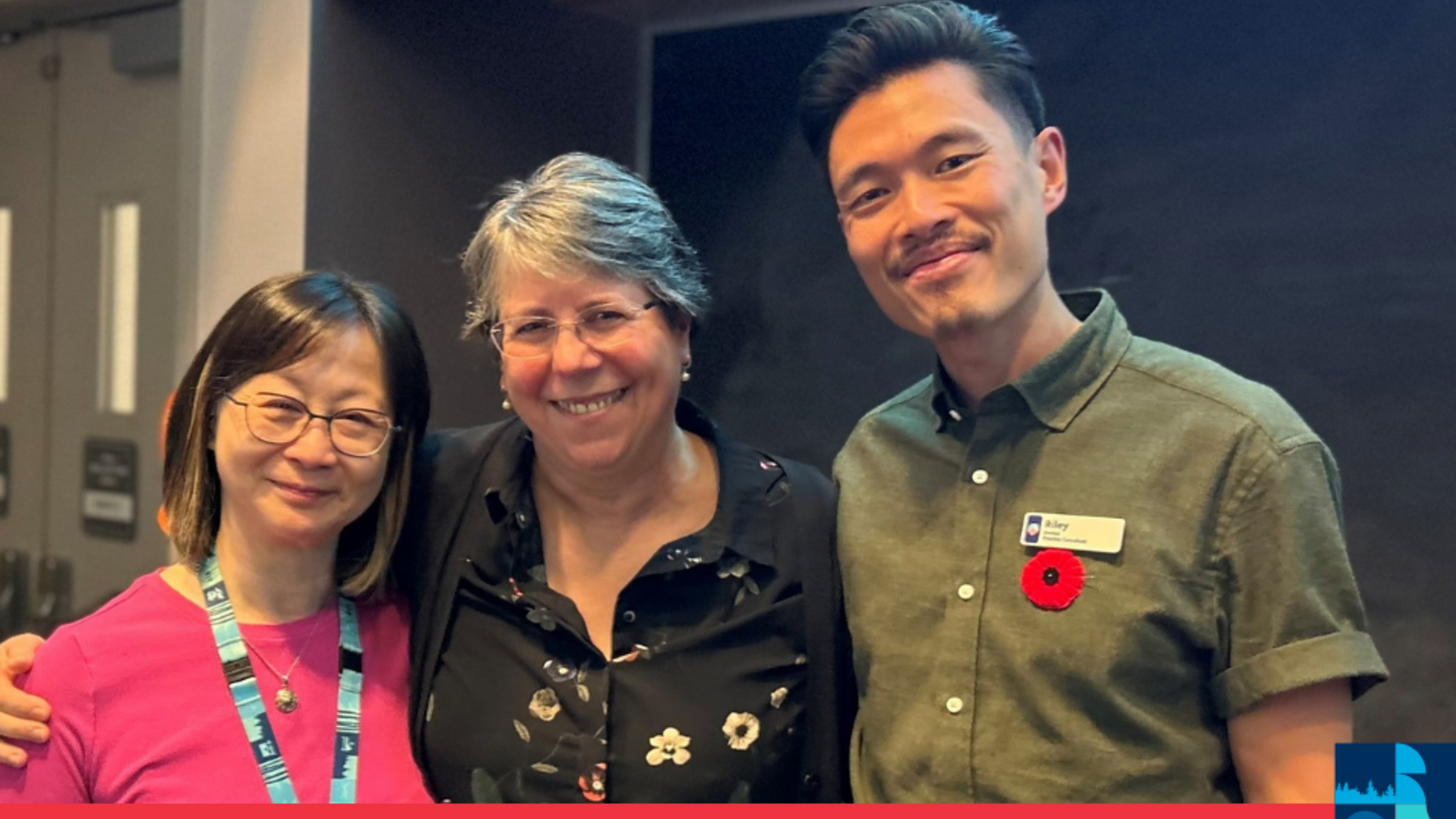 Aggie Black, centre with team members Wilma Chang (L) and Riley Louie. 